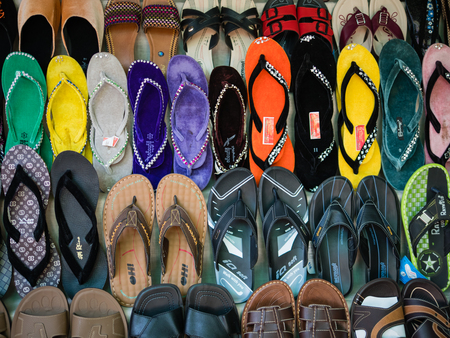 Bagan , Myanmar - October 21, 2016: Flipflops selling in Mani Sithu Market in Nyaung-U village, Bagan, Myanmar (Burma)のeditorial素材