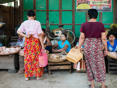 Bagan , Myanmar - October 21, 2016: Burmese People at Mani Sithu Market in Nyaung-U village, Bagan, Myanmar (Burma)のeditorial素材