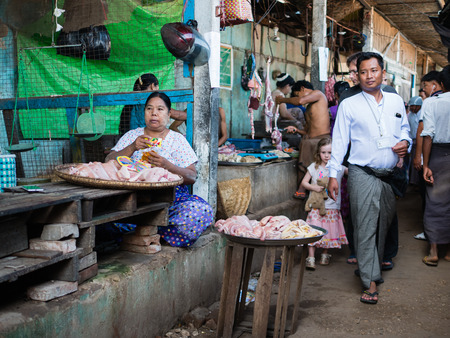 Bagan , Myanmar - October 21, 2016: People at Mani Sithu Market in Nyaung-U village, Bagan, Myanmar (Burma)のeditorial素材