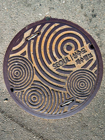 Seoul, South Korea - October 16, 2017: Manhole cover at Hongdae street, seoul, South Koreaの写真素材