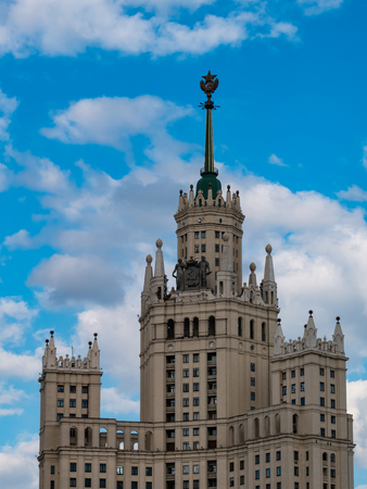 Moscow, Russia - June 13, 2018: Kotelnicheskaya Embankment Building is one of seven Stalinist skyscrapers designed by Dmitry Chechulin and Andrei Rostkovsky. The main tower has 32 levels and is 176 metres tall.のeditorial素材