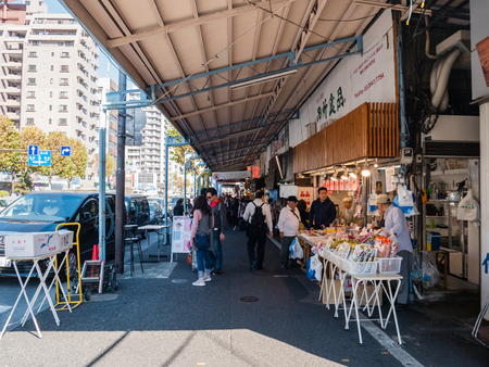 Tokyo, Japan - October 30, 2018: Japanese and tourists are visiting Tsukiji Fish Market in Tokyo, Japan. It is the biggest wholesale fish and seafood market in the world.のeditorial素材
