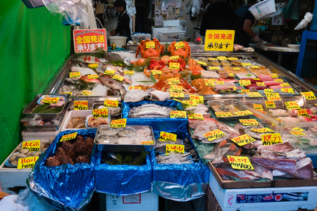 Tokyo, Japan - October 30, 2018: Vendor in Tsukiji Fish Market in Tokyo, Japan. It is the biggest wholesale fish and seafood market in the world.のeditorial素材