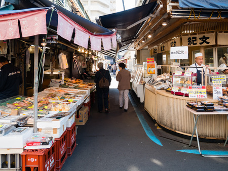 Tokyo, Japan - October 30, 2018: Japanese and tourists are visiting Tsukiji Fish Market in Tokyo, Japan. It is the biggest wholesale fish and seafood market in the world.のeditorial素材