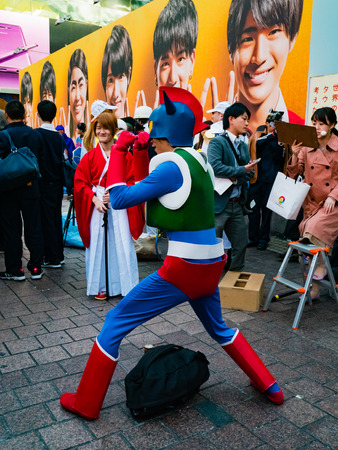 Tokyo, Japan - October 31, 2018: Shibuya station and crossing area is crowded with people wearing Halloween costumes on October 31, 2018のeditorial素材