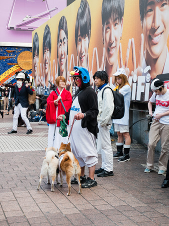 Tokyo, Japan - October 31, 2018: Shibuya station and crossing area is crowded with people wearing Halloween costumes on October 31, 2018のeditorial素材