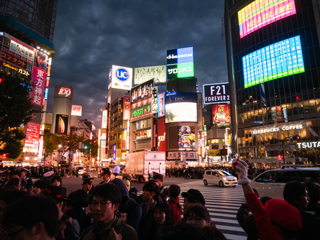Tokyo, Japan - October 31, 2018: Cityscape of Shibuya with crowd people on crosswalk. Shibuya is a special ward located in Tokyo, Japan for shopping and events.のeditorial素材