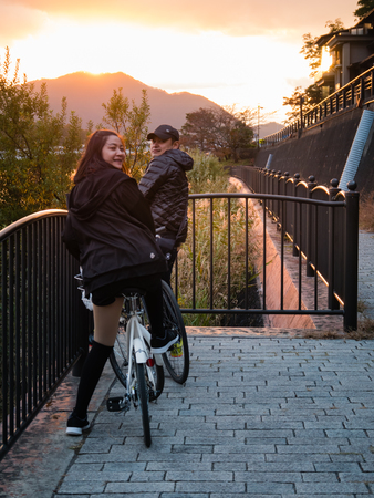 Kawaguchi, Japan - November 1, 2018: Tourist with bicycle near lake Kawaguchi, Japan for sightseeing.のeditorial素材
