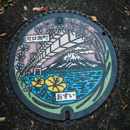 Kawaguchi, Japan - November 1, 2018: Manhole cover on the street near lake Kawaguchi, Japan.のeditorial素材