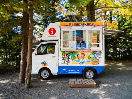 Kawaguchi, Japan - November 1, 2018: Tourist information bus parking near to Chureito Pagoda in Fujiyoshida, Yamanashi Prefecture.のeditorial素材