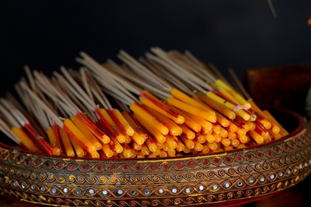 Candles and incense to worship Buddha idol in Buddhism, Thailandのeditorial素材
