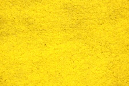 Yellow craft paper backgroundの写真素材