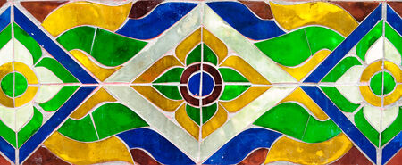 The Thai tradition color glass graphic of temple  wallの写真素材