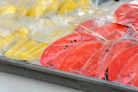 Sliced watermelon ready to eat in plastic bag served chill.の写真素材