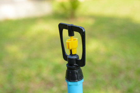 Close up head of water sprinkler plastic made.