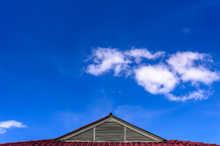 Roof of house under the clear blue sky.の写真素材