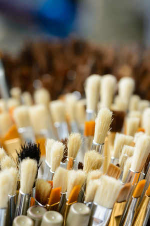 Close up hair of paintbrush, shallow focus on midground.の写真素材