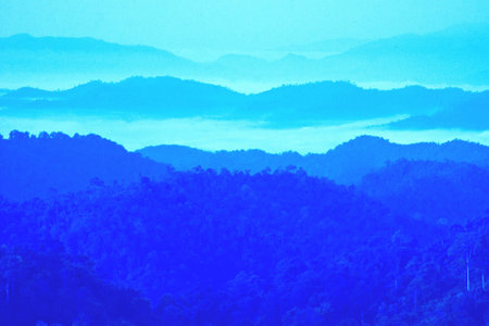 Hazy layers mountain scene in Khao kra Jom, Thailandの写真素材