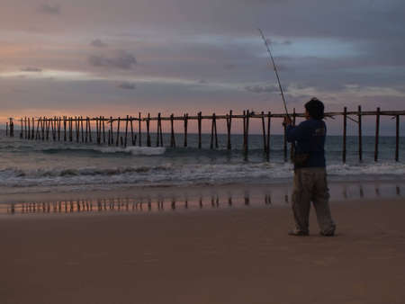 sunset and fishingの写真素材
