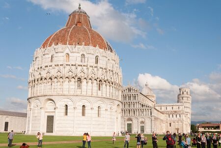 Pisa, Italy-October 22, 2013: The Duomo of Santa Maria Assunta Basilica is a major tourist attraction along with the Leaning Tower at Pisa Tuscany, Italyのeditorial素材