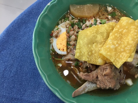 Noodle cooked with pork,egg and dumpling