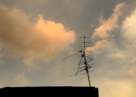 Antenna television with cloud and sky backgroundの写真素材