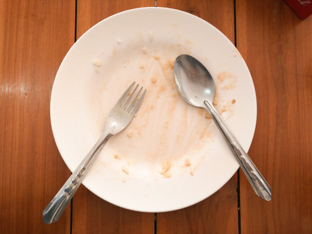 Empty plate left after lunchの写真素材