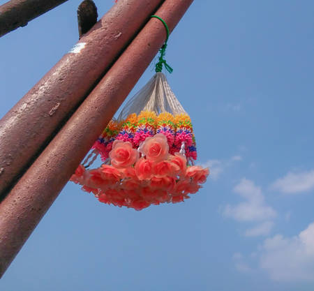 Colorful Artificial flower Garland used for worship  in Thailand.の写真素材