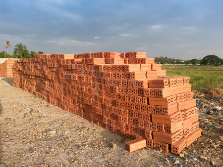 Pile of red bricks.