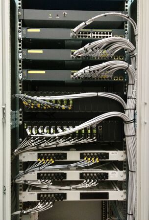 Network switch HUB and ethernet cables (LAN) in datacenter
