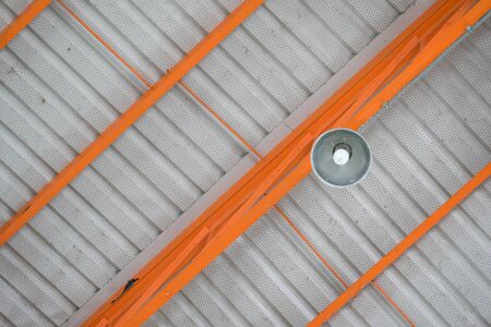 Soft focus, lamp on the roof , Industrial building warehouse ceiling lampの写真素材