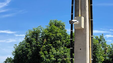 Closed circuit camera Multi-angle CCTV system against the blue sky.