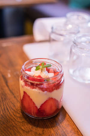 Cooking strawberry puddingの写真素材