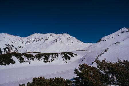 Mountains in the winter. Snow-capped peaks of the Caucasus Mountains.