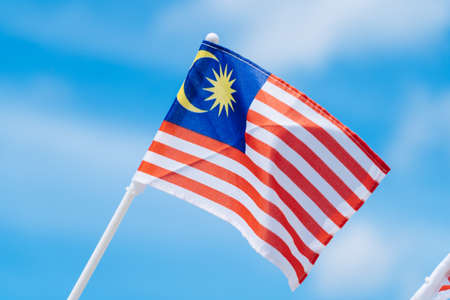 Malaysia flag against blue sky.の写真素材