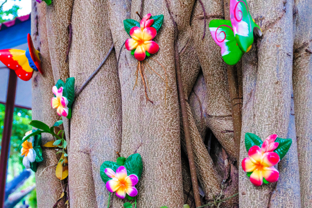 beautiful Fake flowers on treeの写真素材