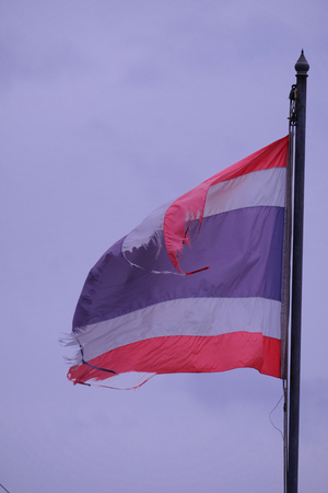 old Thai grunge flag. flag of Thailand in the windの写真素材