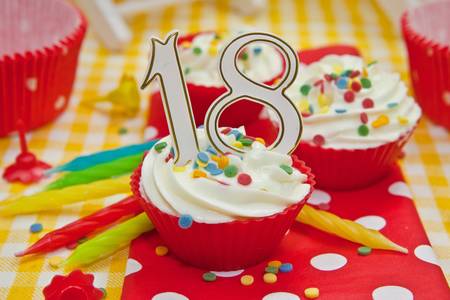 Creamy cupcakes for a birthday partyの写真素材
