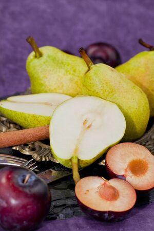 Fresh autumn fruit in a vintage bowlの写真素材