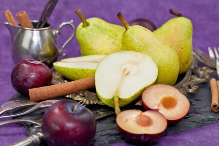 Fresh autumn fruit in a vintage bowlの写真素材