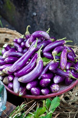 Fresh aubergines at a balinese marketの写真素材