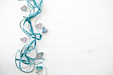 Decorative background with wooden hearts