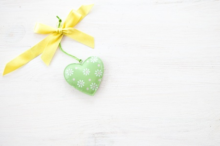 White wooden background with heartの写真素材