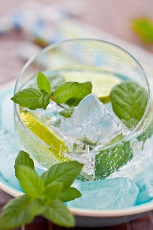 Cold drink with lime and iceの写真素材