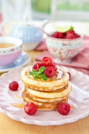Pancakes with fresh red berriesの写真素材