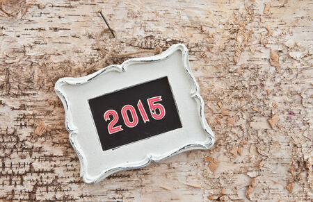 Vintage chalkboard on a rustic wooden backgroundの写真素材