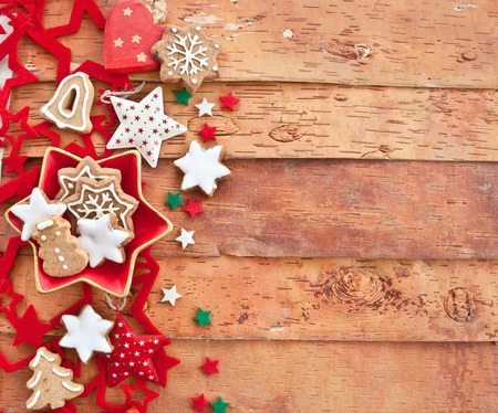 Christmas cookies and decorations won rustic wooden backgroundの写真素材