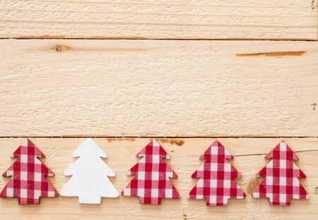 Rustic christmas background with red plaid christmas treeの写真素材