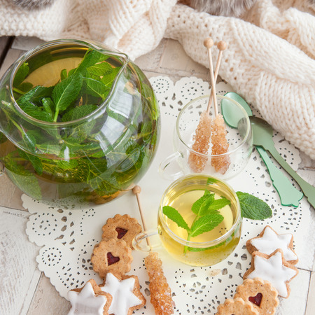 Tea with fresh mint leaves and sugar candyの写真素材