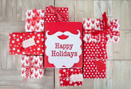 Christmas presents in red and white wrapping paper